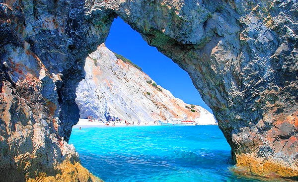 View of the beach through a rock formation SKIATHOS PHOTO GALLERY - BEACH THROUGH THE ROCK