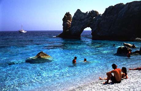 Lalaria is a pebbled beach and it is not easy to walk without shoes. The stones are slippery and round and in a light grey colour with many nice shades.  